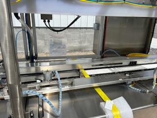 Hamrick 600D-S Case Packer with a Hamrick TT-25 HS Case Sealer image 18