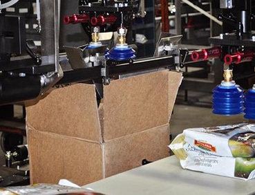 Massman Top Load Case Packer